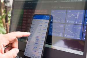 Computer screen displaying algorithmic trading charts and automated trading systems in action